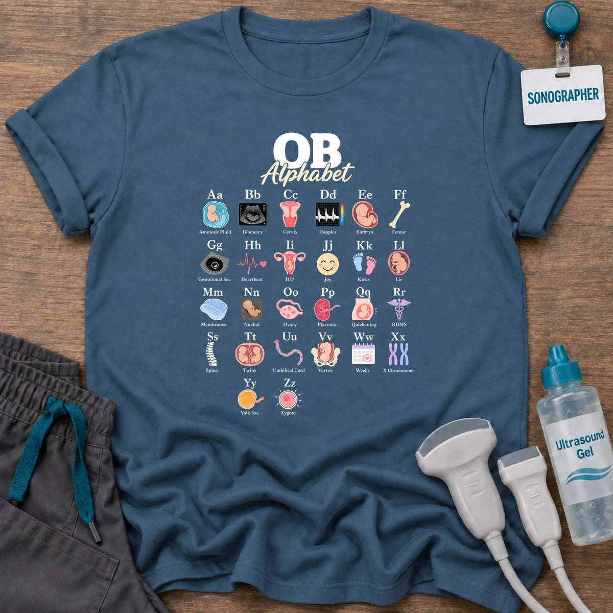 OB Alphabet t-shirt with an A to Z OB ultrasound alphabet chart with icons from Amniotic Fluid and Biometry to Yolk Sac and Zygote, in Indigo Blue, by Sono Graphics