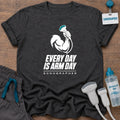 Arm Day Male Sonographer t-shirt with a muscular flexed arm gripping an ultrasound probe above the words “Every Day Is Arm Day, Sonographer”, in Dark Heather, by Sono Graphics