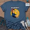 Retro We Can Scan It sonographer t-shirt with a retro Rosie the Riveter-style sonographer flexing while holding an ultrasound probe under a “We Can Scan It!” speech bubble, in Indigo Blue, by Sono Graphics
