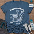 How Vascular Ultrasound Works t-shirt with a line-art diagram of a female vascular tech at an ultrasound machine with funny labels like “Plaque Hunting Headquarters”, in Indigo Blue, by Sono Graphics