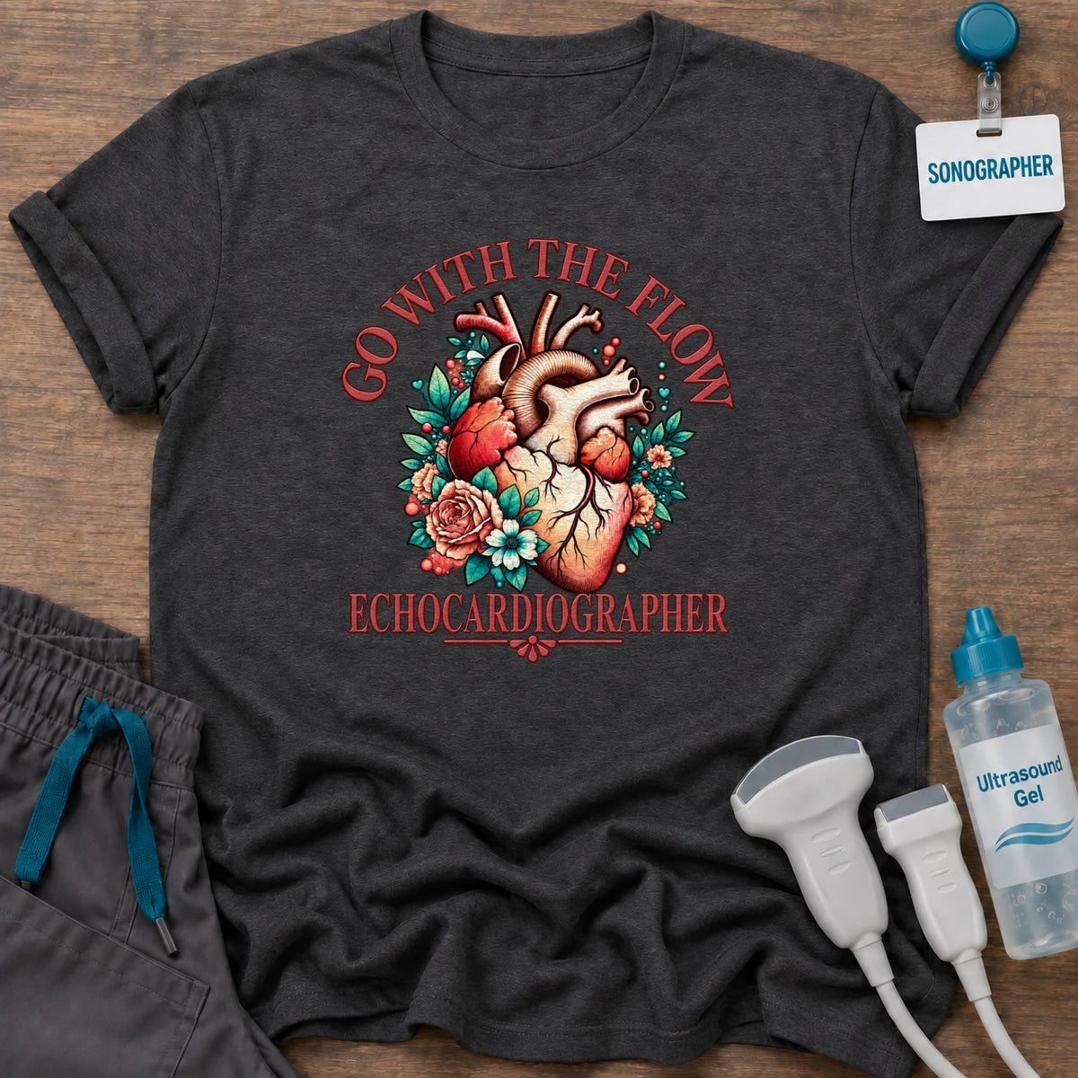 Go With the Flow Echo sonographer t-shirt with an anatomical heart in red roses and teal leaves and the word Echocardiographer, in Dark Heather, by Sono Graphics