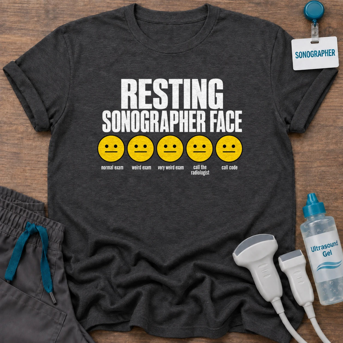 Resting Sonographer Face t-shirt with five emoji faces from normal exam to call the radiologist, in Dark Heather, by Sono Graphics