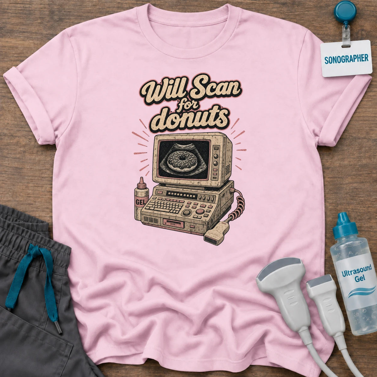 Will Scan for Donuts Retro Ultrasound sonographer t-shirt with a vintage ultrasound machine showing a donut on the screen under the words “Will Scan for Donuts”, in Light Pink, by Sono Graphics
