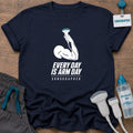 Arm Day Female Sonographer t-shirt with a woman's flexed arm gripping an ultrasound probe above the words “Every Day Is Arm Day, Sonographer”, in Navy, by Sono Graphics
